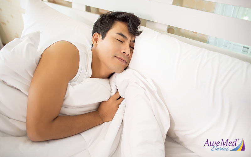 Person Tucking Into Bed