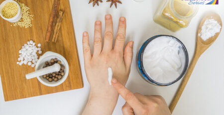 A person applying homemade cream
