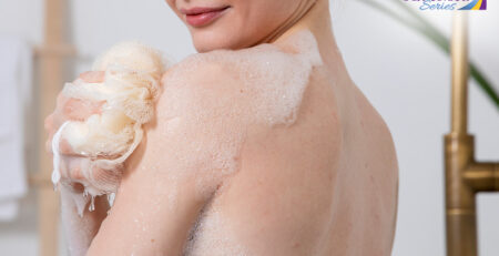 A woman using body wash